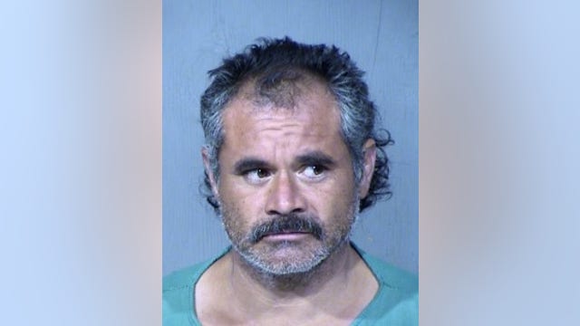 PD: Suspect arrested after security guard finds man dead in Phoenix parking lot