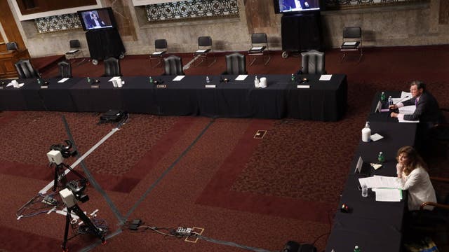 Faxes and email: Old technology slows COVID-19 response