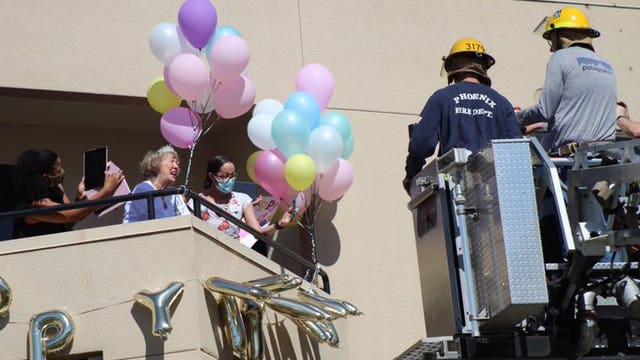 Phoenix Fire Department uses ladder truck to help family wish grandmother 100th birthday amid COVID-19