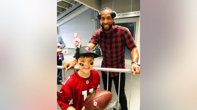 Larry Fitzgerald surprises boy on final day of cancer treatment