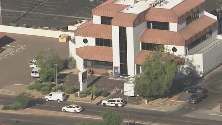 Security guard finds man dead in Phoenix parking lot