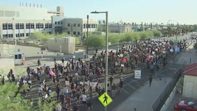 Hundreds take the streets of downtown Phoenix for a 17th consecutive day of protests