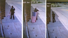 Nebraska officer seen fixing fallen US flag at auto-repair shop: 'The respect it deserves'