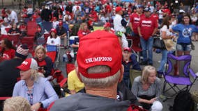 Metal barriers, Trump gear: Crowd readies for Tulsa rally