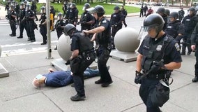 Charges dropped for Buffalo officers seen shoving elderly protester