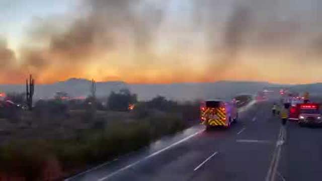 Firefighters battle 100-acre fire in Phoenix, winds becoming an issue