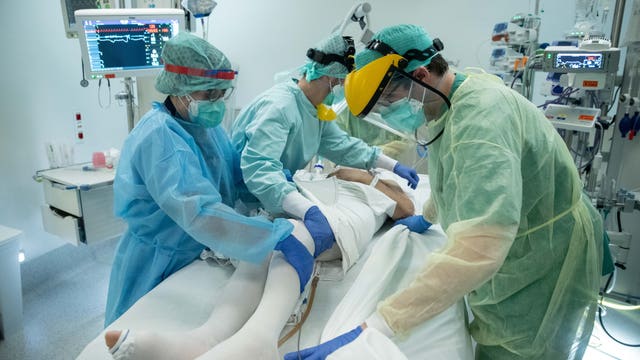 Some states break coronavirus records as US caseload grows anew