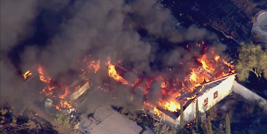 Residents allowed to return home as crews gain upper hand in Aquila Fire battle