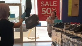 Video captures woman throwing shoes at store employee after being asked to wear a mask