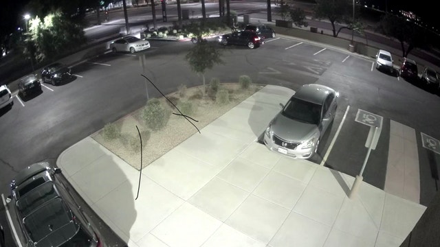 Goodyear Police investigating after surveillance video captures man forcing woman into car