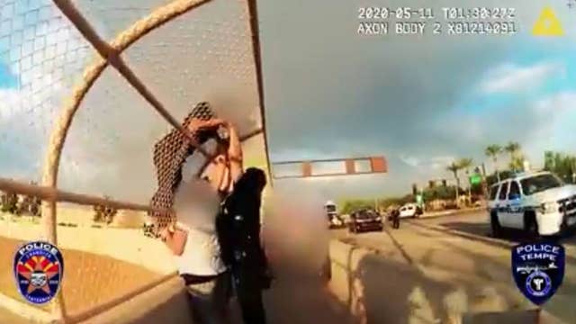 Arizona police officers convince man to climb down freeway overpass