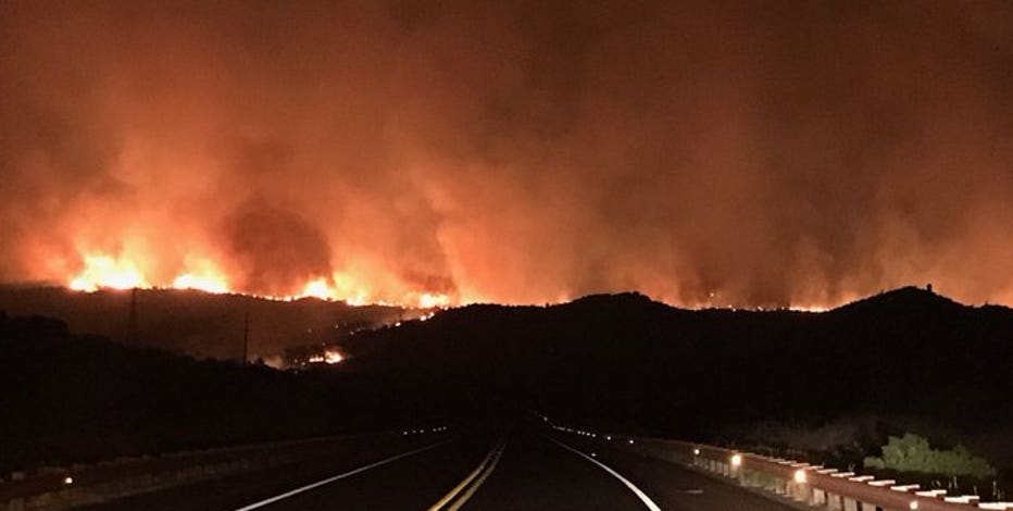 Highway reopens after being closed for days while crews battled Arizona wildfires