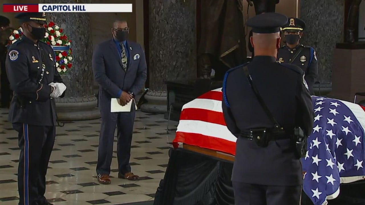 Ruth Bader Ginsburg’s personal trainer does push-ups in front of her casket in tribute