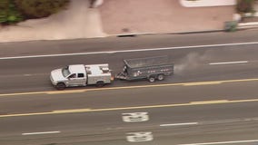 Police pursuit ends with standoff on PCH in Malibu