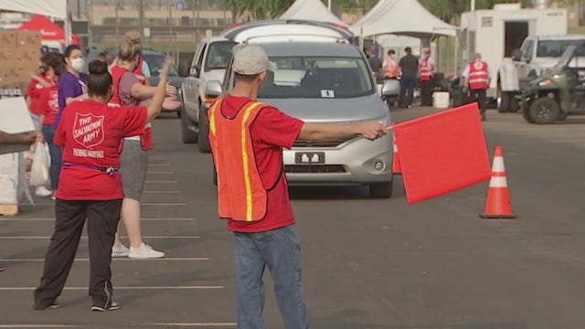Operation Feed the Need: Salvation Army gives away food, gifts to Phoenix residents in need