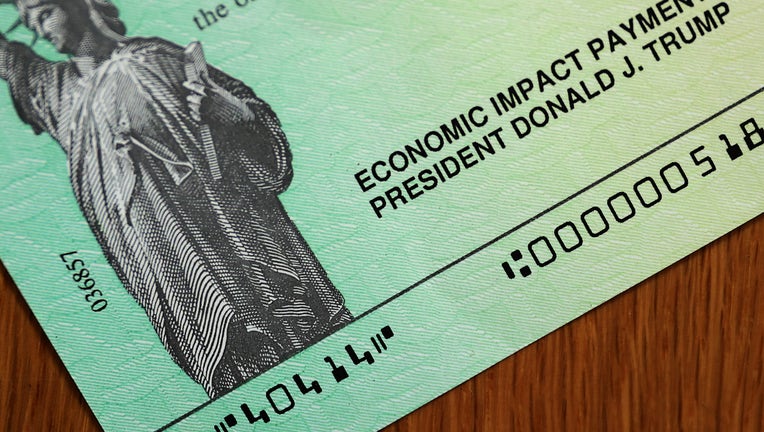 Stimulus check with donald deals trump's name on it