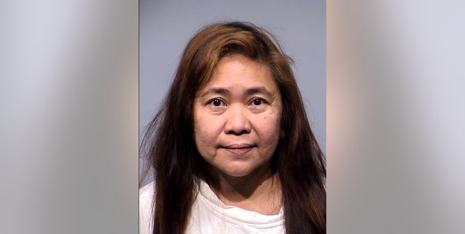 Caregiver of elderly Arizona man accused of theft, forgery