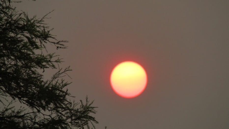 Why Does the Sun Look Red? Wildfires Are Often to Blame