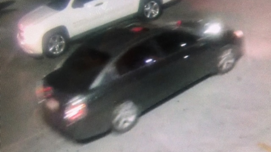 Dark-colored suspect vehicle