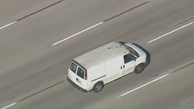 Police pursuit ends after driver surrenders, cargo van rolls down street