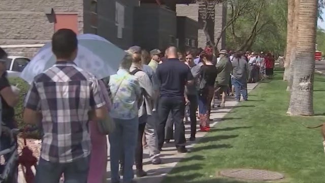 Waiting to vote on Election Day could lead to waiting in long lines