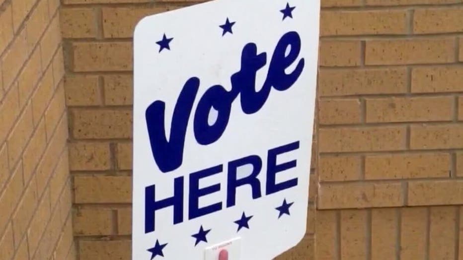 Vote here sign