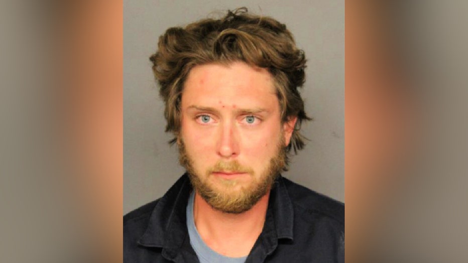 Matthew Dolloff, 30, was taken into custody in connection with a clash that took place Saturday afternoon in Civic Center Park.