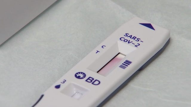 People rush to take COVID-19 tests amid holidays and surge in new cases