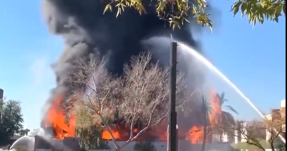 Phoenix crews battle large fire at abandoned building near State Route ...