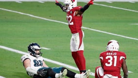 Murray, Hopkins lead Cardinals past Eagles 33-26