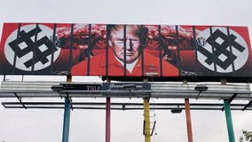 New billboard in downtown Phoenix shows Trump behind bars in prison jumpsuit