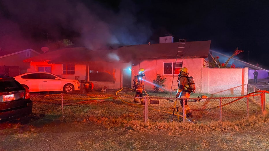 Massive fire breaks out after car crashes into Phoenix home