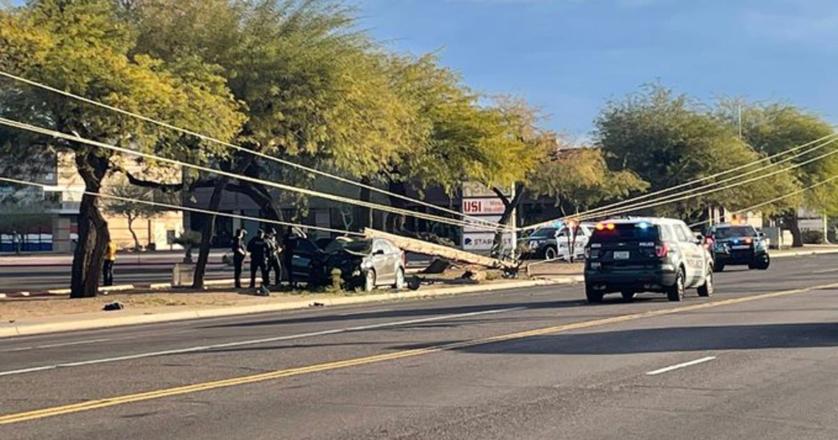 Woman, child critically injured after car crashes into power pole and ...
