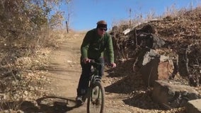 Arizona college professor turns bike rides into a fundraiser for students