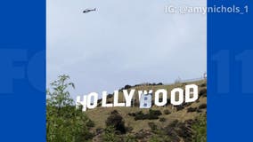 Holly-... what? Pranksters alter iconic Hollywood sign, 6 in custody