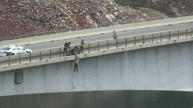 Deputies save man dangling from bridge in Tuolumne County