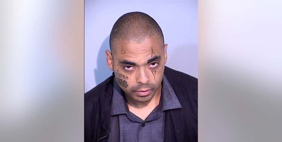 Phoenix woman escapes from axe-wielding suspect with help from stranger