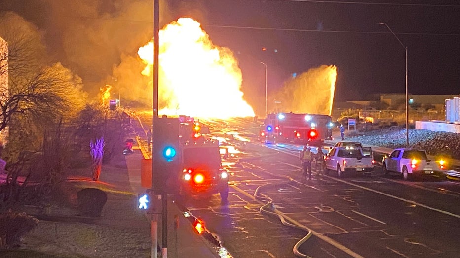 Firefighters battle the 7th Street fire over the Salt River
