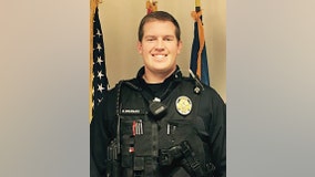 Officer shot in the neck recovering in hospital;  fundraising effort underway