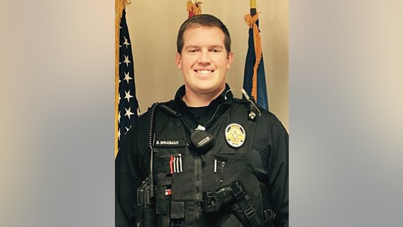Officer shot in the neck recovering in hospital;  fundraising effort underway