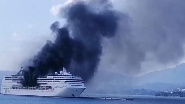 Cruise ship catches fire in Greece, sending plumes of black smoke into air