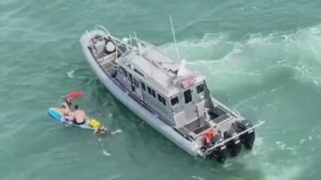 Kids found clinging to paddleboard over a mile off Florida coast