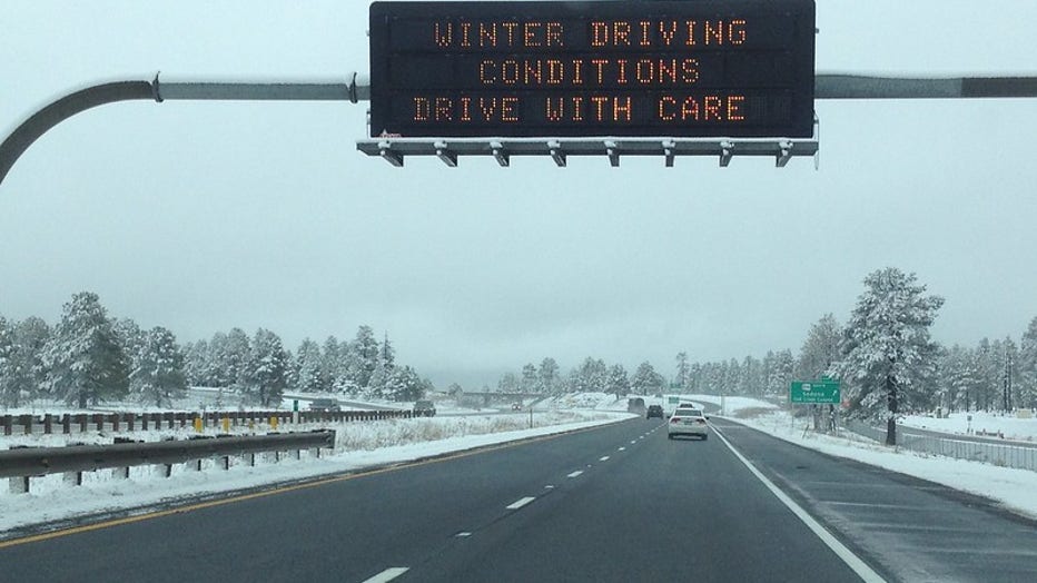 Overhead sign snow message
