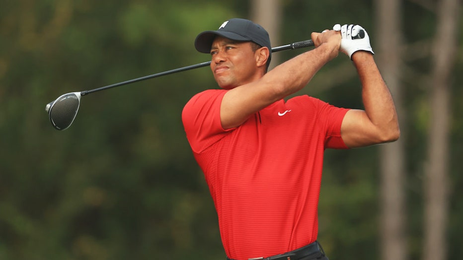 tiger woods sunday red polo