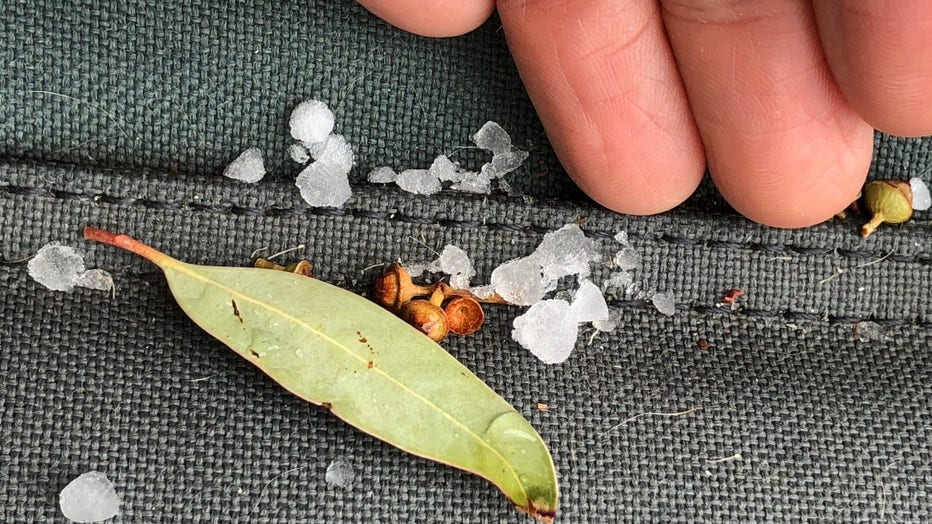 A photo showing what appears to be tiny hail or graupel in the Wickenburg area.