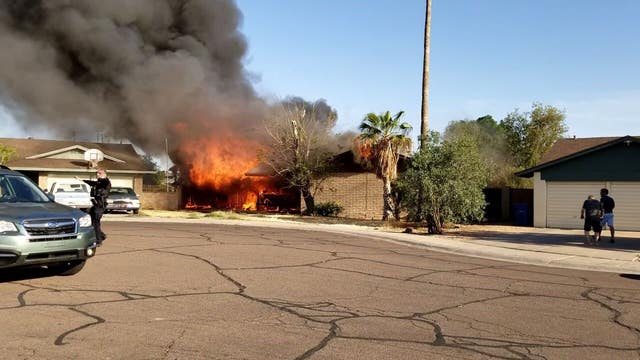 Neighbor and his friends rescue man, his dog from burning Tempe home