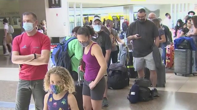 Travel woes: Travelers waiting in line for hours to get a rental car in Arizona