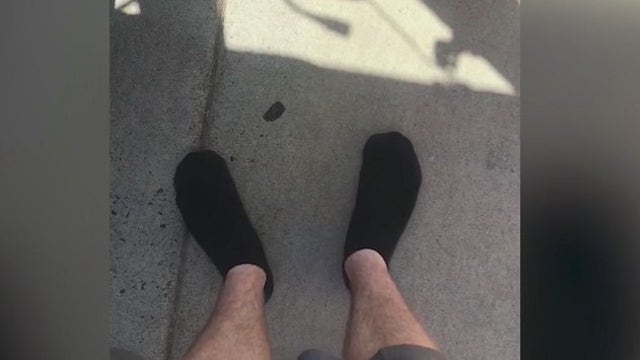 Arizona postal worker gives shoes to barefoot elderly woman while checking her mail