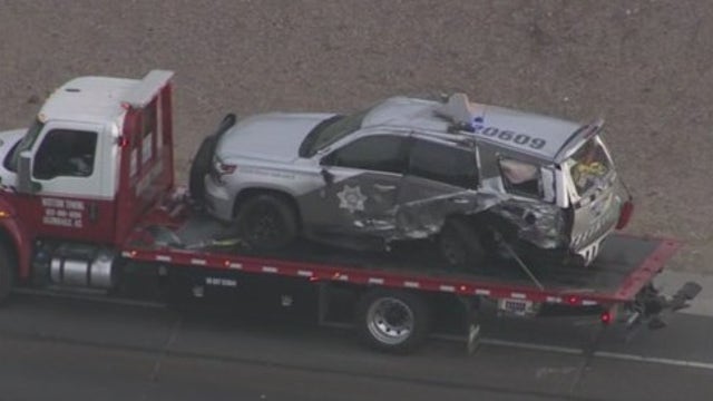 DPS: Car struck patrol vehicle while troopers were clearing another crash scene on US 60