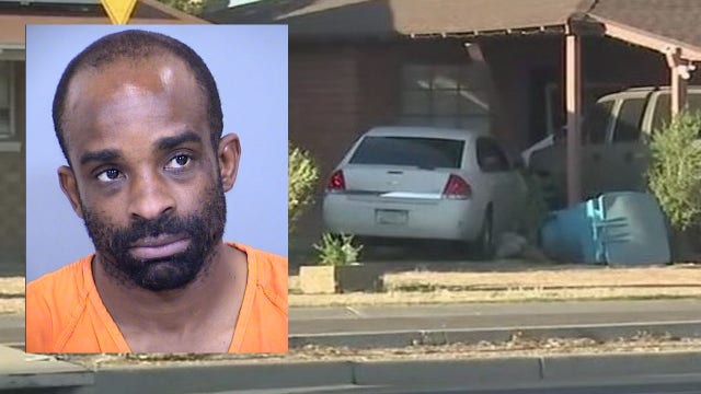 Suspect accused of murder, aggravated assault after car crashes into Phoenix home